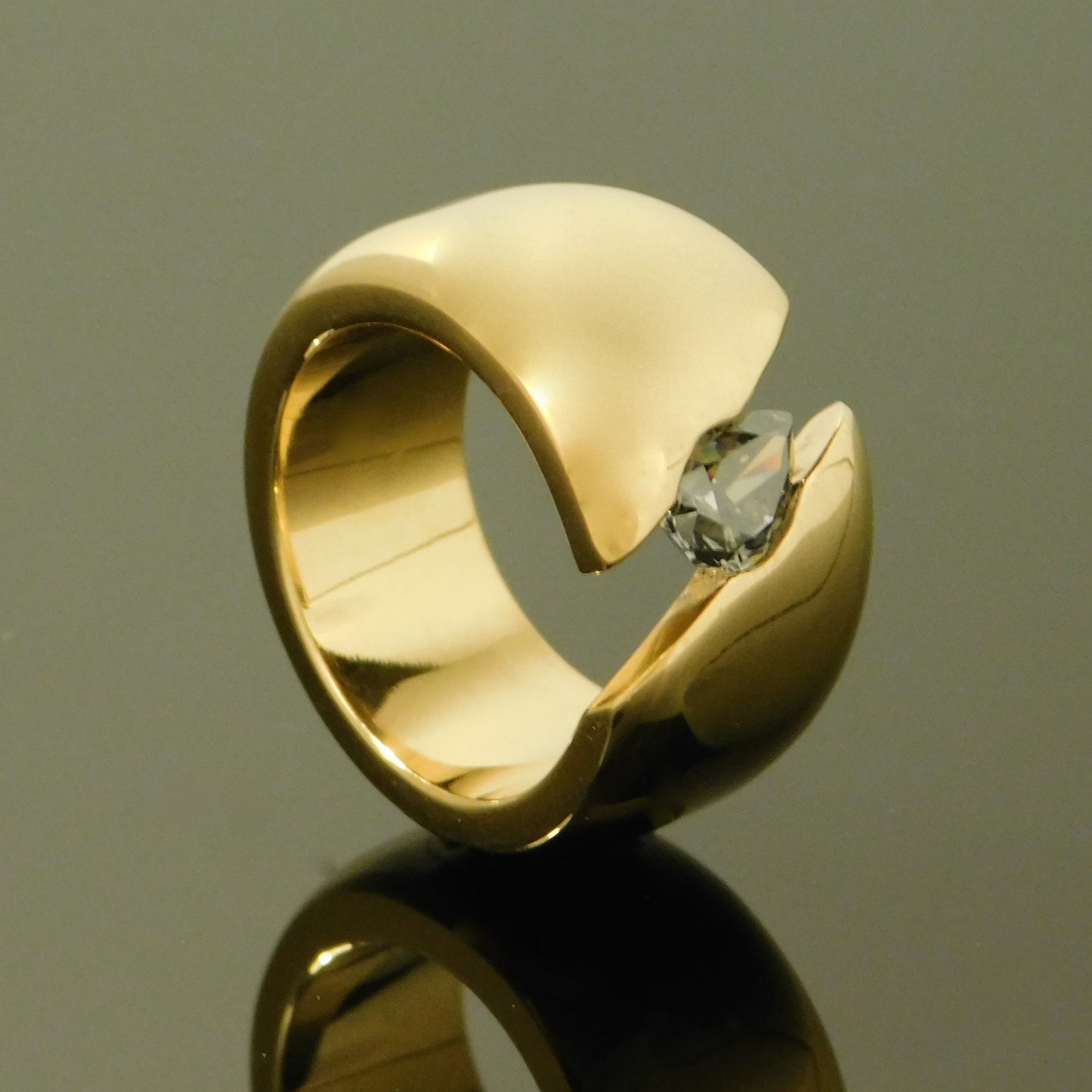 Wide Band Gray Moissanite Ring: Gold Dome Tension Setting