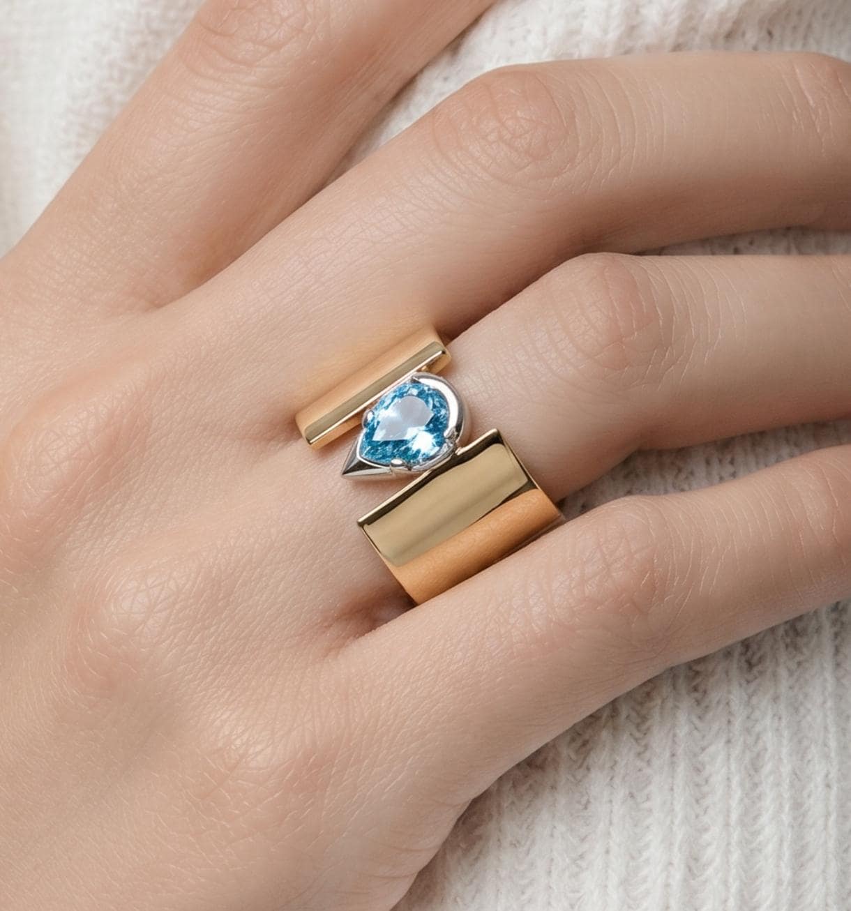 Wide Band Engagement Ring: Blue Topaz Pear Shape, Bi-Metal Gold Tone And Silver