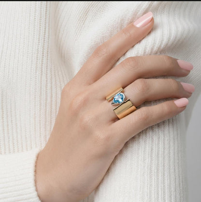 Wide Band Engagement Ring: Blue Topaz Pear Shape, Bi-Metal Gold Tone And Silver