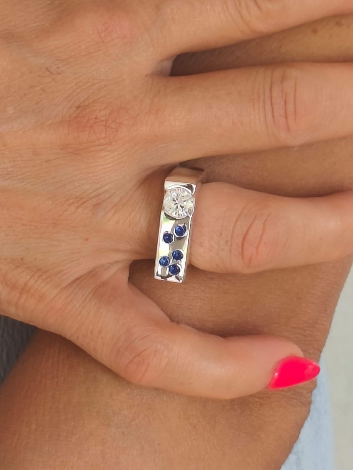 Contemporary Engagement Ring: Moissanite Silver Solitaire with Small Cubic Zirconia accents