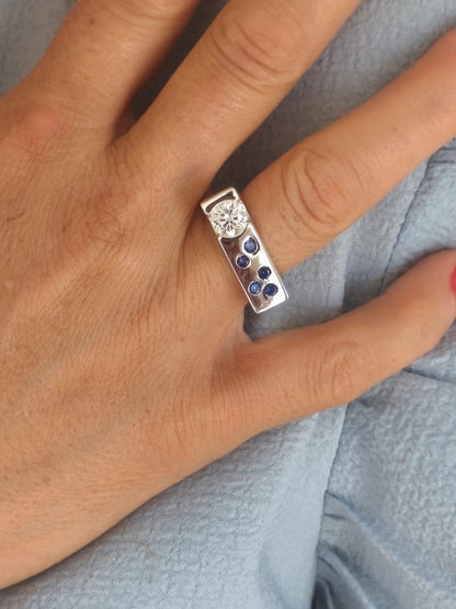 Contemporary Engagement Ring: Moissanite Silver Solitaire with Small Cubic Zirconia accents