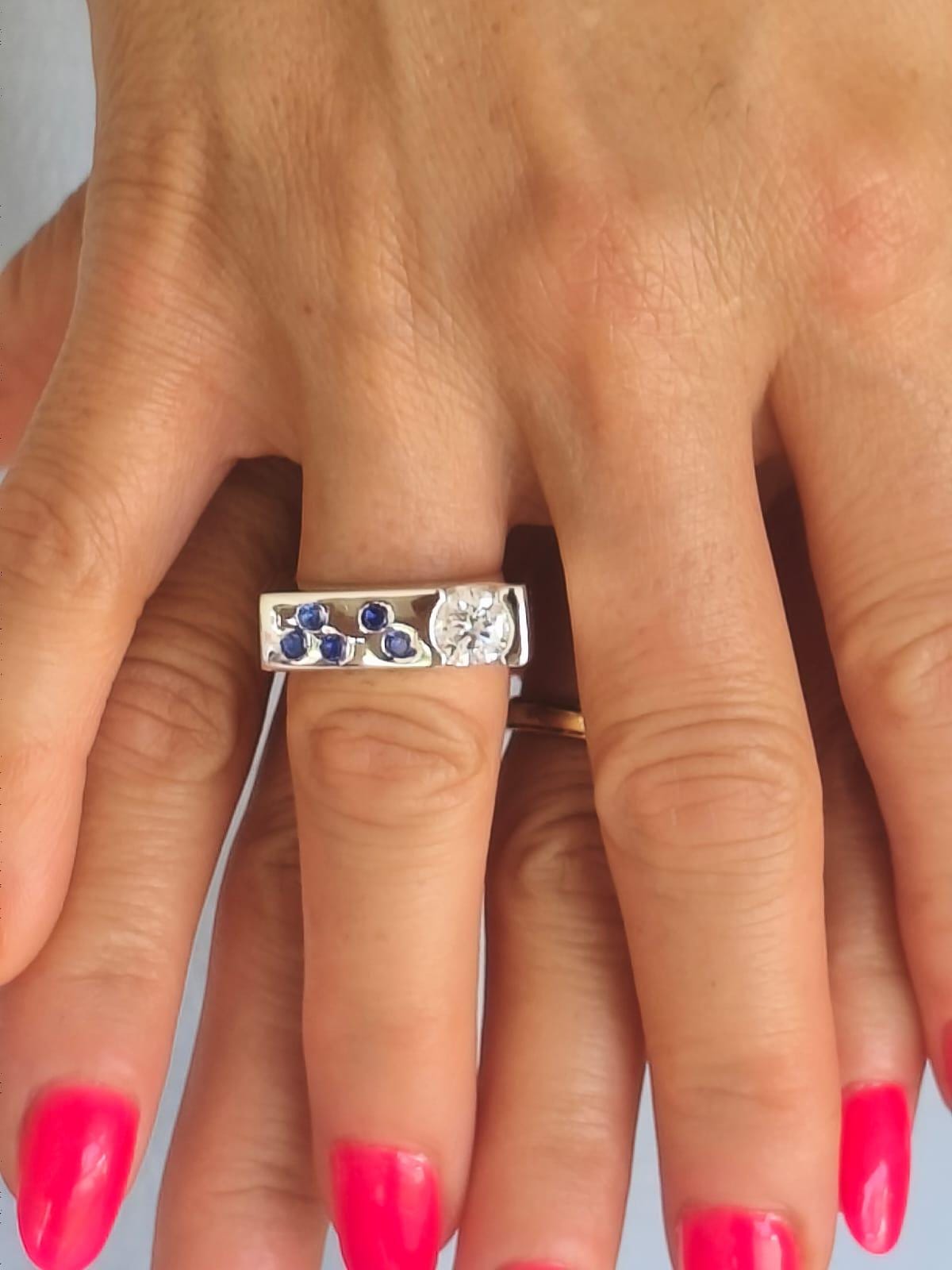 Contemporary Engagement Ring: Moissanite Silver Solitaire with Small Cubic Zirconia accents