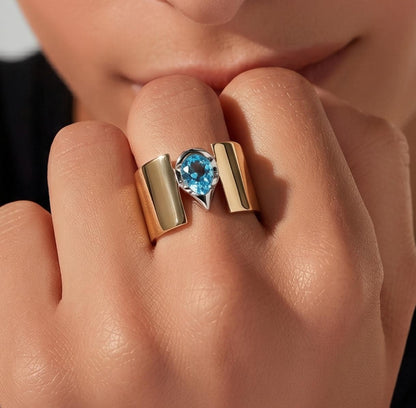 Wide Band Engagement Ring: Blue Topaz Pear Shape, Bi-Metal Gold Tone And Silver